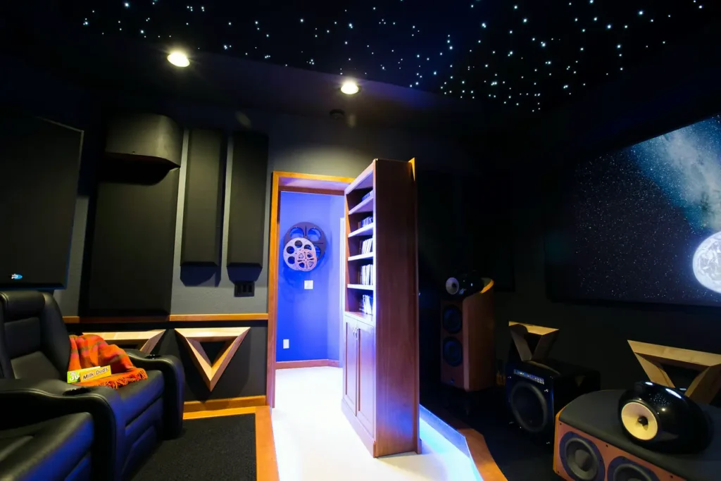 Luxurious Las Vegas home theater with starry ceiling, plush seating, and advanced audio equipment.