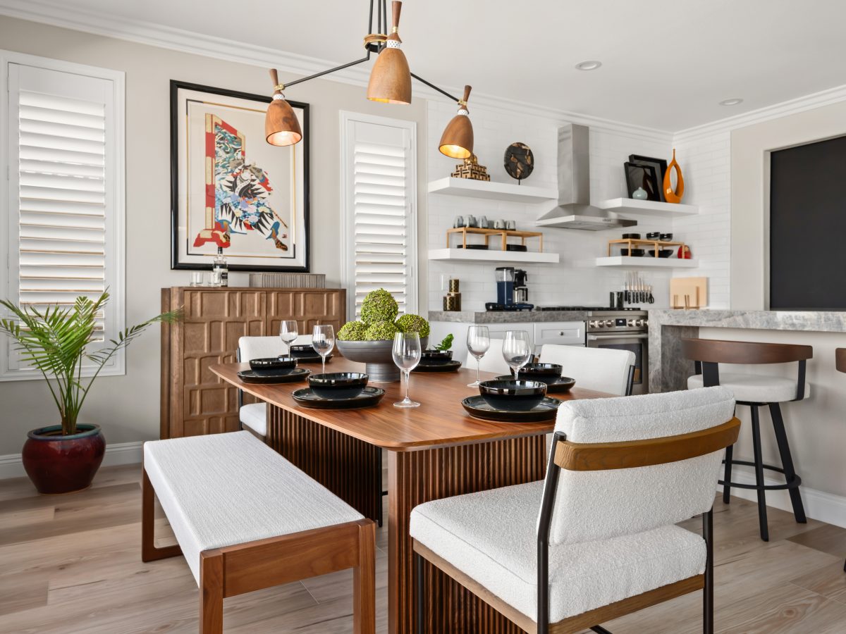 Japandi-inspired dining room with modern walnut table and dimensional storage chest, Reveal Interior Design Las Vegas