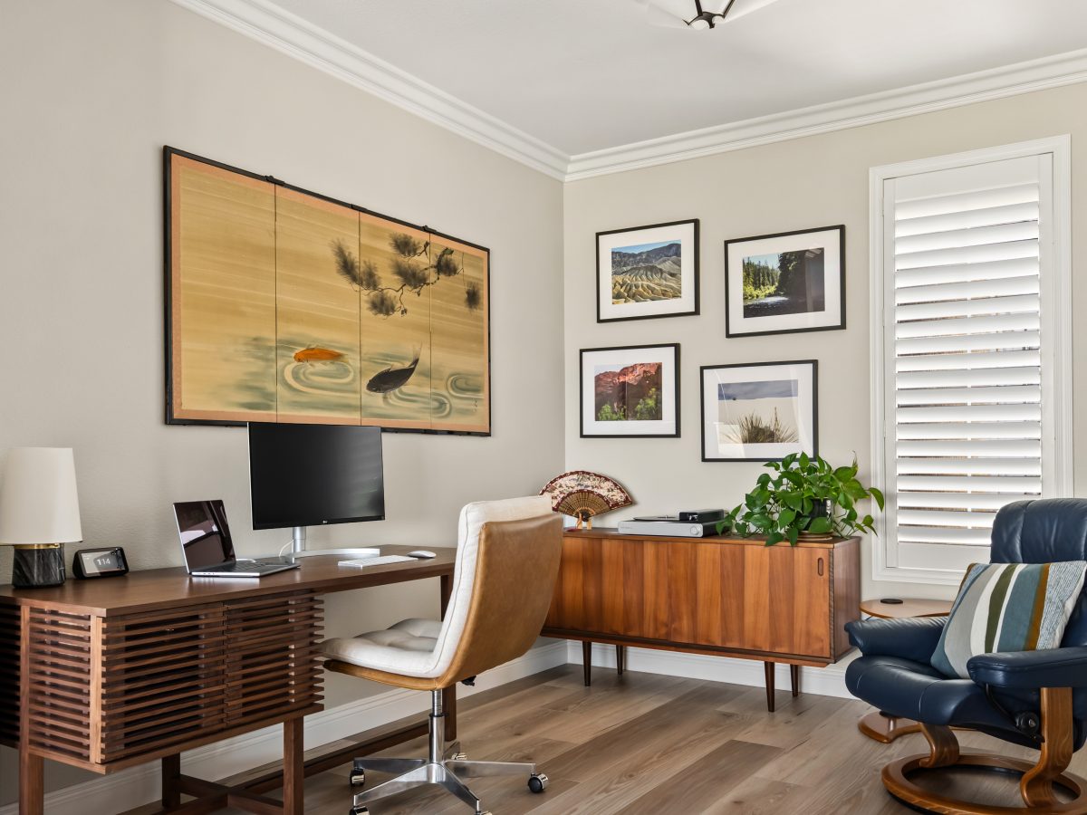 Mid-century modern home office with Japanese-inspired wall art and walnut storage desk, Reveal Interior Design Las Vegas