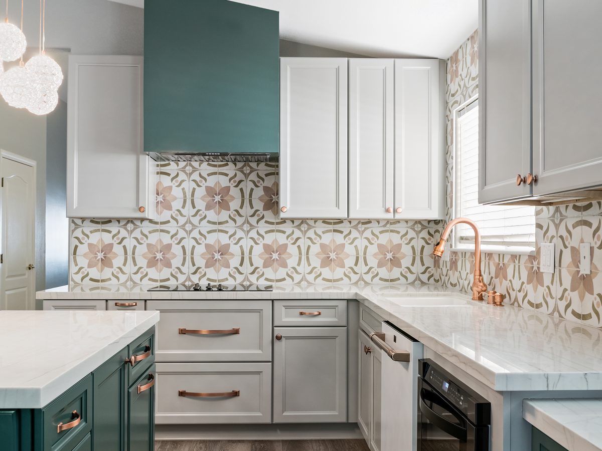 Emerald green and beige kitchen with encaustic ceramic tile backsplash and white quartz countertops, Reveal Interior Design Las Vegas