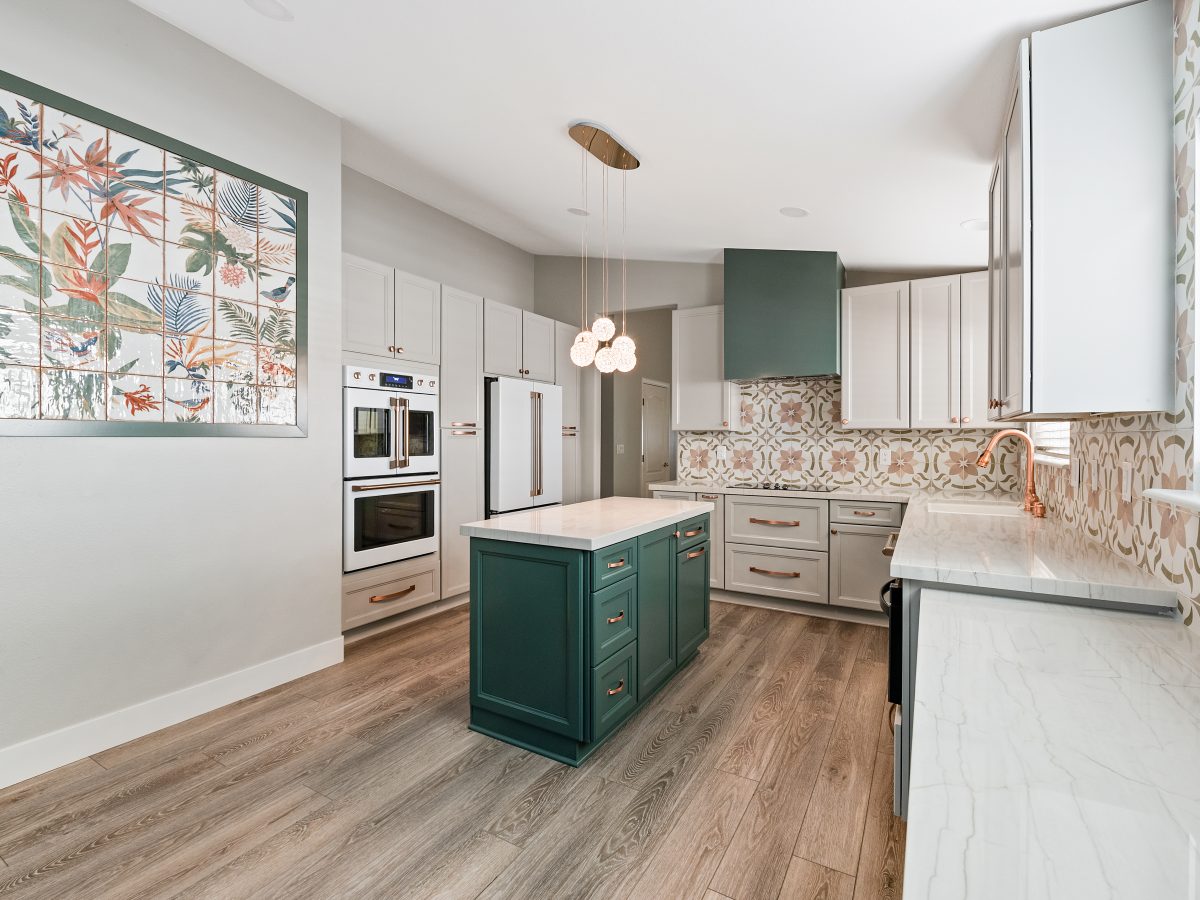Emerald green island kitchen with encaustic ceramic tile backsplash and white quartz countertops, Reveal Interior Design Las Vegas