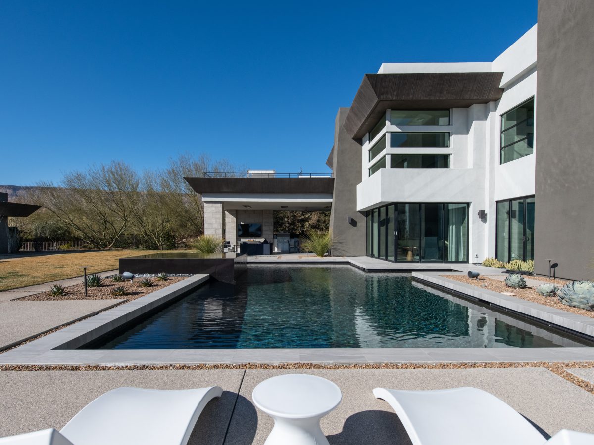 Desert Modern pool and outdoor living area with geometric lap pool and casita, Reveal Interior Design Las Vegas