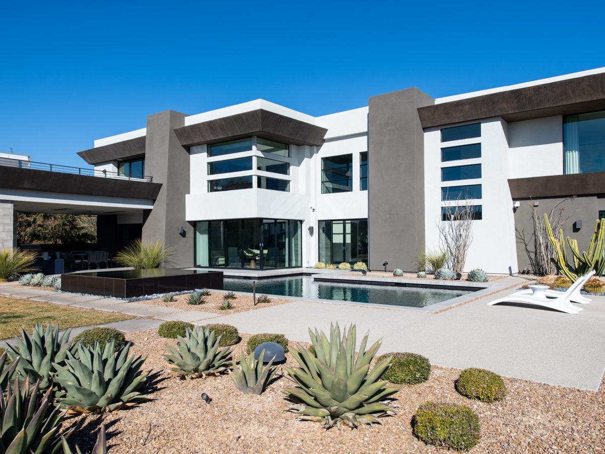 Desert Modern exterior with geometric pool and xeriscape landscaping, Reveal Interior Design Las Vegas