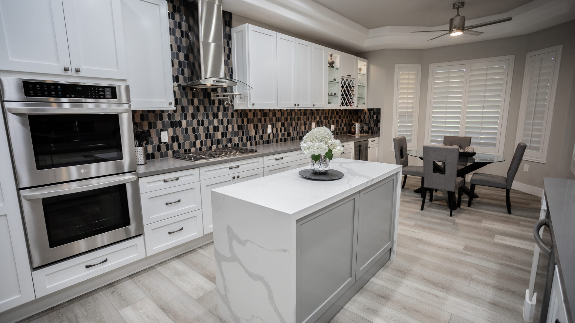 Contemporary waterfall island kitchen design Las Vegas, Reveal Interior Design