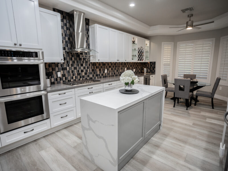 Contemporary waterfall island kitchen design Las Vegas, Reveal Interior Design