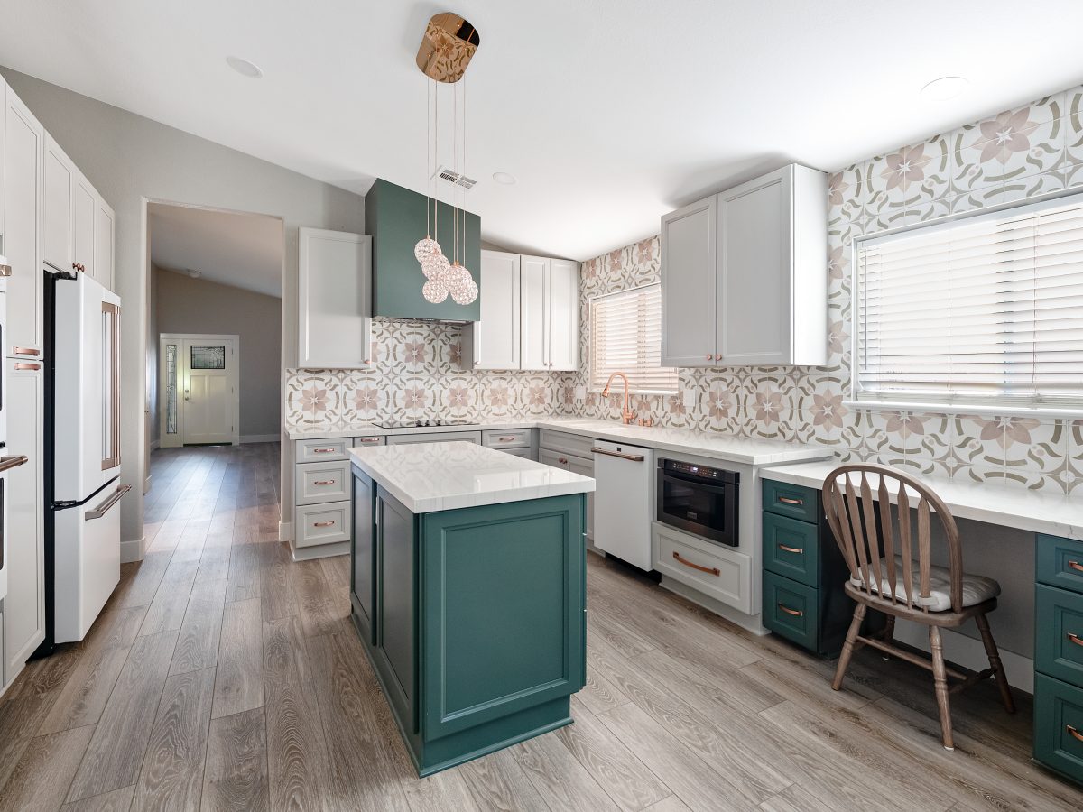 Emerald green and beige kitchen with encaustic ceramic tile backsplash and white quartz island, Reveal Interior Design Las Vegas