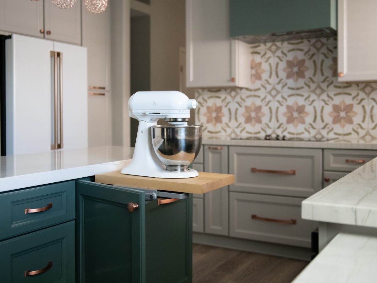 Transitional kitchen with emerald cabinetry, white quartz countertops, and encaustic ceramic tile backsplash, Reveal Interior Design Las Vegas