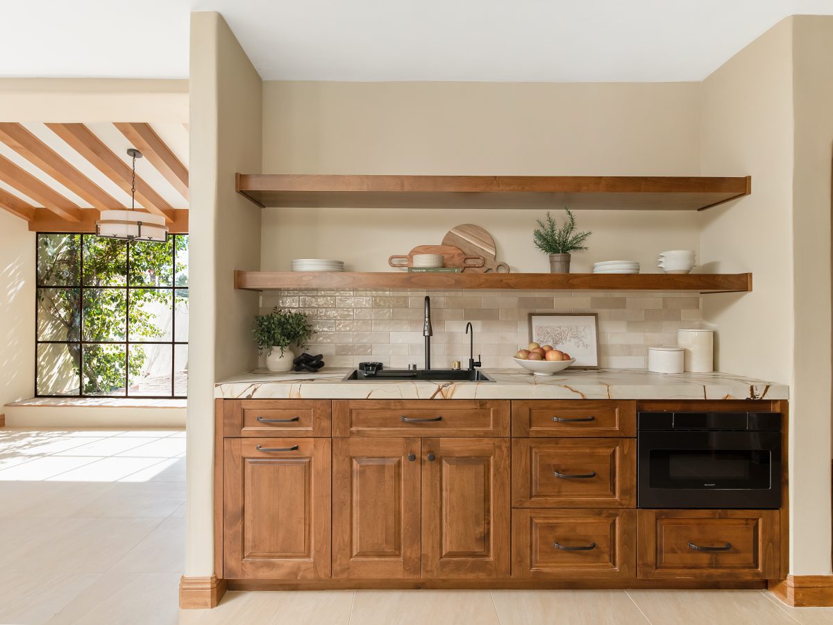 Spanish Modern kitchen butler's pantry with stained maple cabinetry and floating shelves, Reveal Interior Design Las Vegas