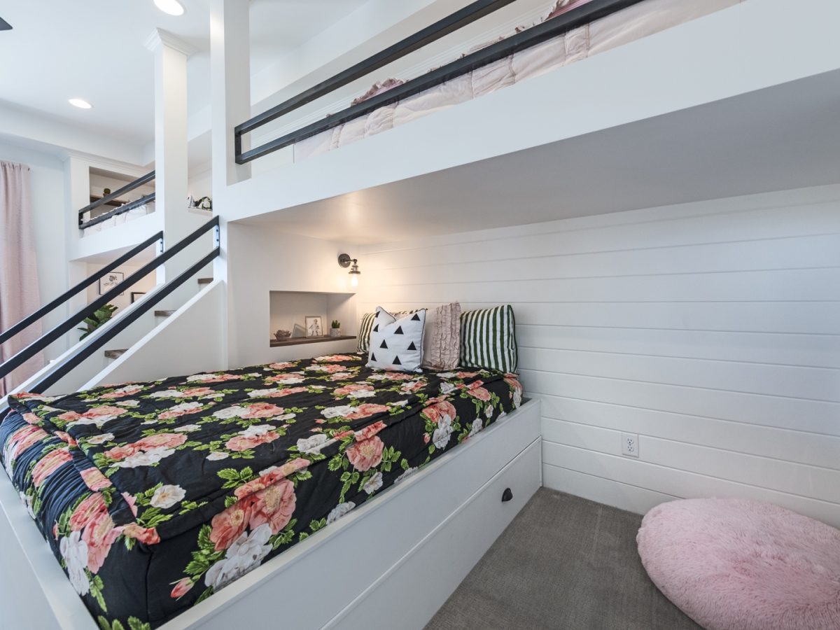 Custom queen and twin bunk beds with white millwork and black metal framing, Reveal Interior Design Las Vegas